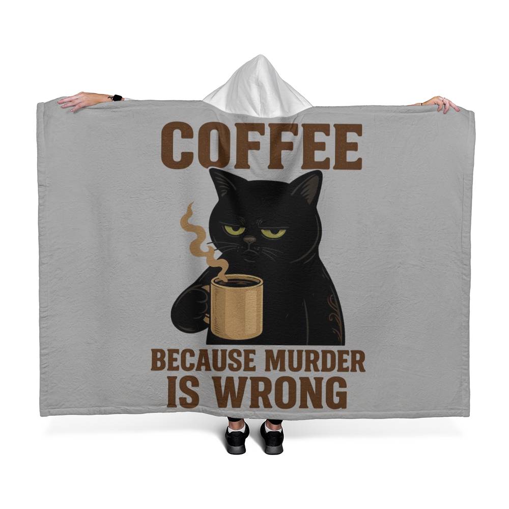 Person holding a gray hoodie with a black cat and coffee cup design, text 'Coffee because murder is wrong'.