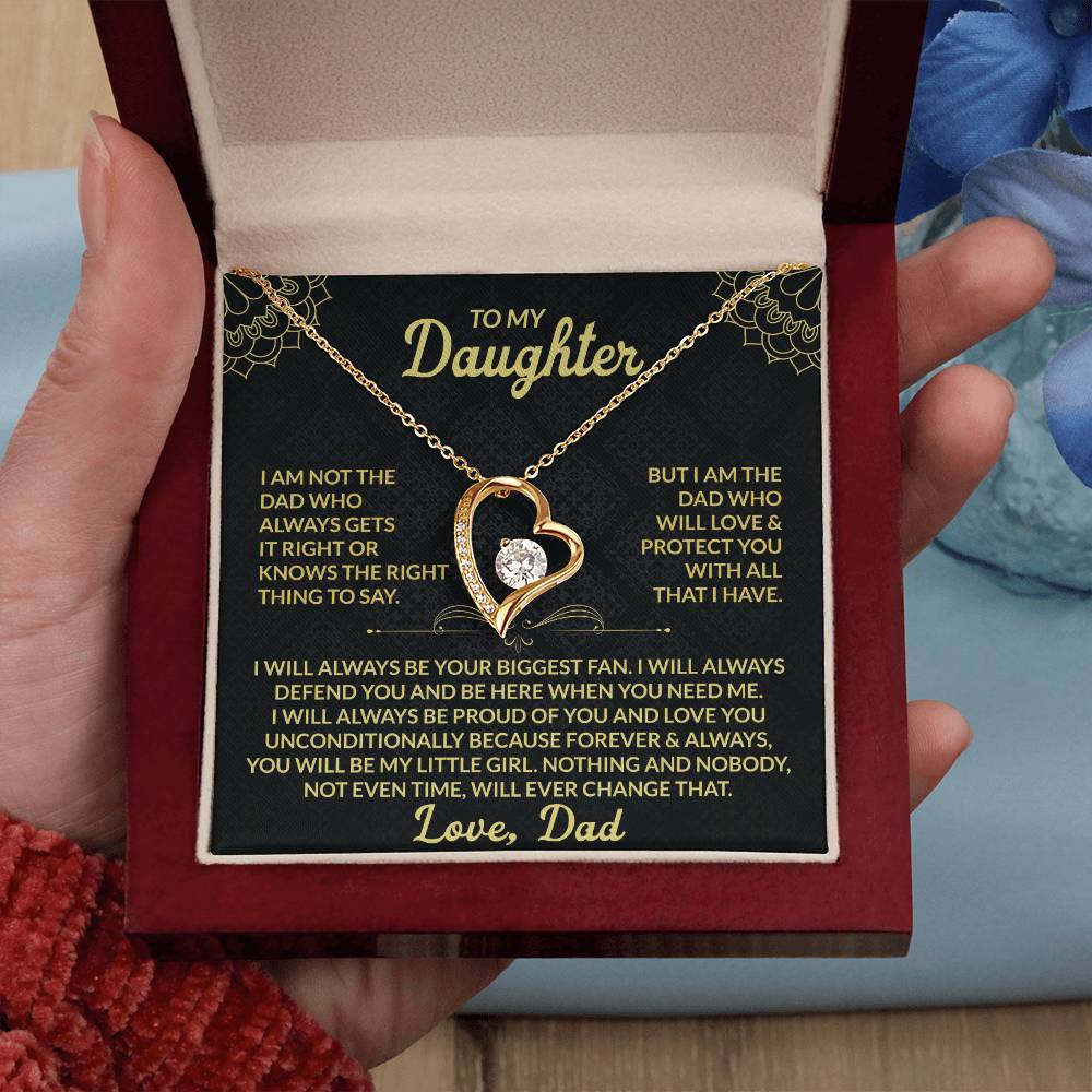 Luxury gold heart pendant necklace from dad to daughter, displayed in red box with sentimental message card and cozy holiday sweater