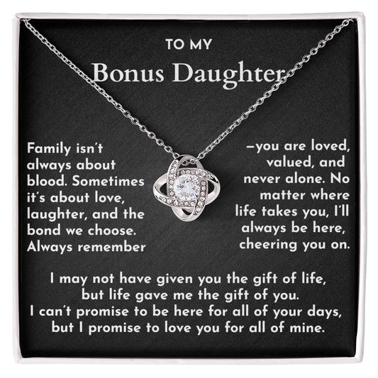 Necklace with a heart-shaped pendant on a card for a bonus daughter, featuring sentimental text.