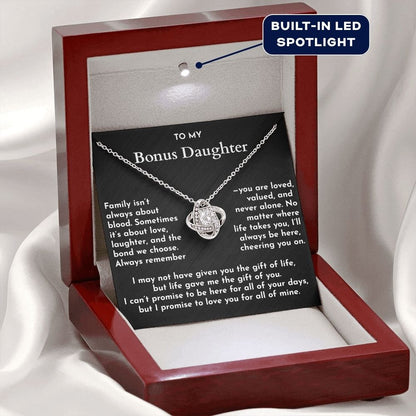Necklace with a sentimental message card in a red box with a built-in LED spotlight.