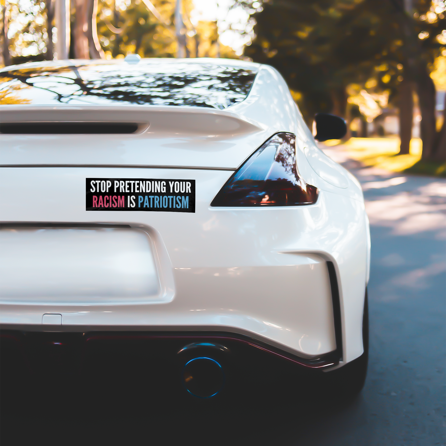 Stop_Pretending_Your_Racism_is_Patriotis_WhiteBumperSticker-White-Car_Mockup.png