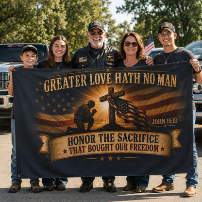 Veteran family holding Christian patriotic John 15:13 flag honoring sacrifice and freedom